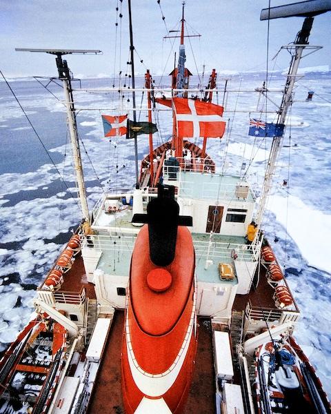 Nella Dan, proudly flying the ANARE Flag, steams through the pack